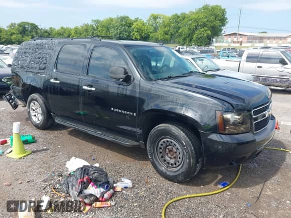 2009 Chevrolet Suburban 1LT z VIN 1GNFC26039J123309, wystawiony jako IAAI lot #42855993 z przebiegiem 267 168 mil mil oraz . Historia ofert i sprzedaży dostępna na DreamBid. Obrazek 1.