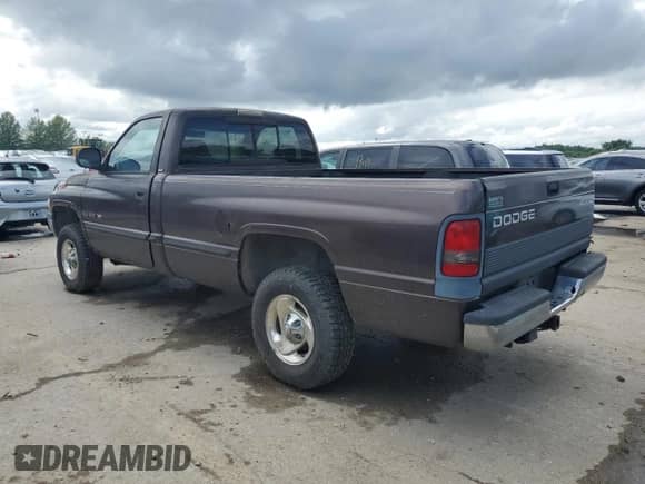 1998 Dodge 1500 with VIN 3B7HF16Z7WM271110, listed as a Copart auction lot 60812495 with 214,381 mi miles and Clean title. Bid and sale history available at DreamBid. Image 2.