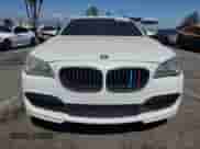2013 BMW 7 Series 750i with VIN WBAYA8C54DC996412, listed as a Copart auction lot 56982895 with 124,258 mi miles and Salvage title. Bid and sale history available at DreamBid. Image 5.