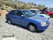 2002 Hyundai Accent z VIN KMHCF35G72U206880, wystawiony jako Copart lot #62286955 z przebiegiem 200 952 mil mil oraz Szkoda całkowita • Salvage title. Historia ofert i sprzedaży dostępna na DreamBid. Obrazek 4.