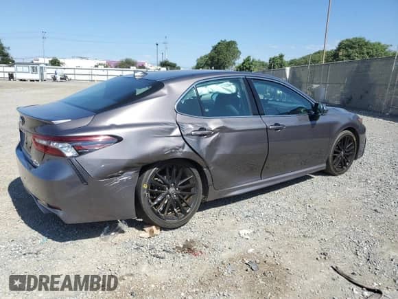 2023 Toyota Camry Hybrid XSE с VIN 4T1K31AK2PU601303, выставлен на аукционе Copart как лот 81736455 с пробегом 23 901 миль миль и Списание • Salvage title. История ставок и продаж доступна на DreamBid. Изображение 3.