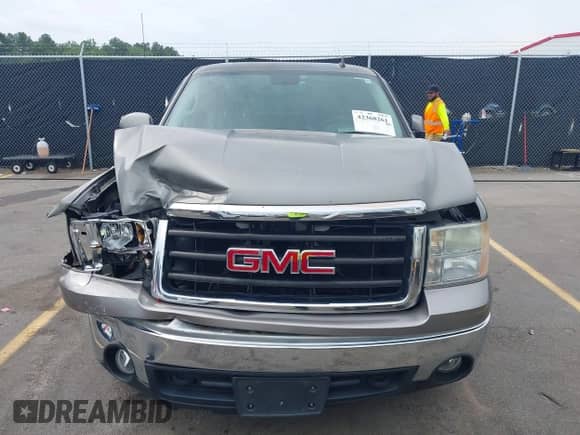2007 GMC Sierra 1500 SLE2 z VIN 1GTEK19087Z523488, wystawiony jako IAAI lot #42368261 z przebiegiem 90 143 mil mil oraz . Historia ofert i sprzedaży dostępna na DreamBid. Obrazek 12.