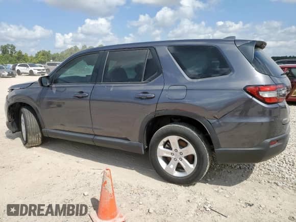 2023 Honda Pilot LX с VIN 5FNYG1H22PB022359, выставлен на аукционе Copart как лот 70882435 с пробегом 36 569 миль миль и Списание • Salvage title. История ставок и продаж доступна на DreamBid. Изображение 2.