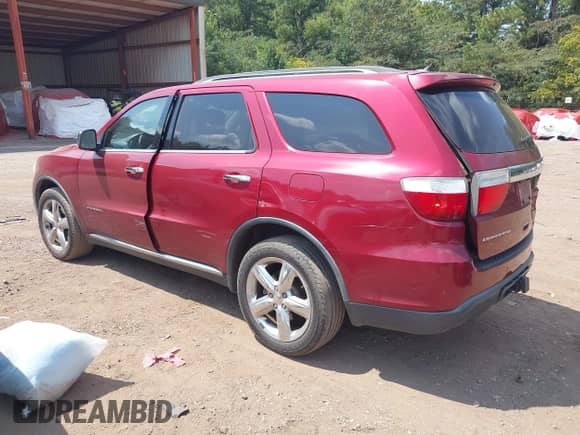 2013 Dodge Durango Citadel with VIN 1C4RDHEG3DC687589, listed as a IAAI auction lot 43042901 with 159,653 mi miles and . Bid and sale history available at DreamBid. Image 3.