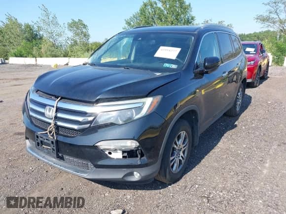 2017 Honda Pilot Touring with VIN 5FNYF5H98HB002514, listed as a IAAI auction lot 42954277 with 167,944 mi miles and . Bid and sale history available at DreamBid. Image 2.