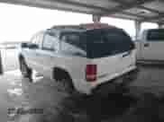 2002 Chevrolet Tahoe LT with VIN 1GNEC13Z92R235435, listed as a IAAI auction lot 42764198 with 248,194 mi miles and . Bid and sale history available at DreamBid. Image 3.