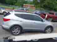 2013 Hyundai Santa Fe Sport z VIN 5XYZWDLA1DG044574, wystawiony jako IAAI lot #42727884 z przebiegiem 168 599 mil mil oraz . Historia ofert i sprzedaży dostępna na DreamBid. Obrazek 13.