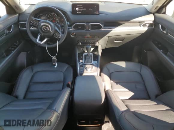 2025 Mazda CX-5 S Carbon Edition z VIN JM3KFBCM6S0679834, wystawiony jako Copart lot #87410845 z przebiegiem 13 497 mil mil oraz Czysty tytuł • Clean title. Historia ofert i sprzedaży dostępna na DreamBid. Obrazek 8.
