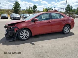 2019 Toyota Corolla L with VIN 5YFBURHE7KP927412, listed as a Copart auction lot 70284545 with 102,405 mi miles and Salvage title. Bid and sale history available at DreamBid. Image 1.