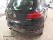 2014 Volkswagen Tiguan SEL with VIN WVGAV3AX8EW563008, listed as a IAAI auction lot 41356523 with 138,211 mi miles and . Bid and sale history available at DreamBid. Image 20.