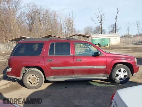 2004 Chevrolet TrailBlazer EXT LS z VIN 1GNET16S946229590, wystawiony jako IAAI lot #41608645 z przebiegiem 149 065 mil mil oraz . Historia ofert i sprzedaży dostępna na DreamBid. Obrazek 13.