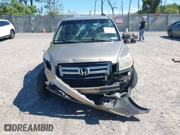 2006 Honda Pilot EX z VIN 5FNYF18426B019092, wystawiony jako IAAI lot #43162613 z przebiegiem 189 862 mil mil oraz . Historia ofert i sprzedaży dostępna na DreamBid. Obrazek 12.