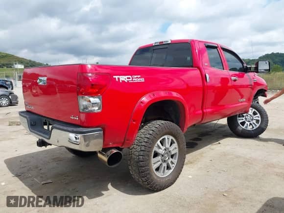 2008 Toyota Tundra with VIN 5TBBV54118S498723, listed as a IAAI auction lot 43085230 with 212,824 mi miles and . Bid and sale history available at DreamBid. Image 4.