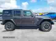 2024 Jeep Wrangler Rubicon with VIN 1C4RJXR6XRW240302, listed as a IAAI auction lot 40772081 with Not provided miles and . Bid and sale history available at DreamBid. Image 13.