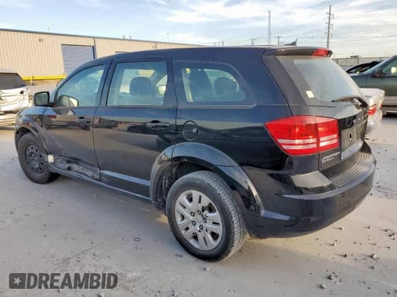 2014 Dodge Journey American Value with VIN 3C4PDCAB1ET283961, listed as a Copart auction lot 65348255 with 200,998 mi miles and Salvage title. Bid and sale history available at DreamBid. Image 2.