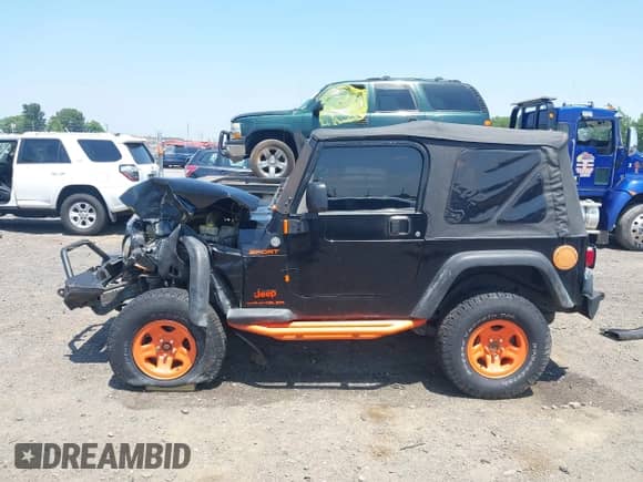 2006 Jeep Wrangler Sport z VIN 1J4FA49S16P784119, wystawiony jako IAAI lot #42470790 z przebiegiem Nie podano mil oraz . Historia ofert i sprzedaży dostępna na DreamBid. Obrazek 13.