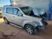 2009 Honda Pilot Touring with VIN 5FNYF48889B042501, listed as a Copart auction lot 82244955 with 187,616 mi miles and Salvage title. Bid and sale history available at DreamBid. Image 4.