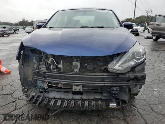2019 Nissan Sentra S с VIN 3N1AB7AP8KY391252, выставлен на аукционе Copart как лот 82276165 с пробегом 75 509 миль миль и Списание • Salvage title. История ставок и продаж доступна на DreamBid. Изображение 5.