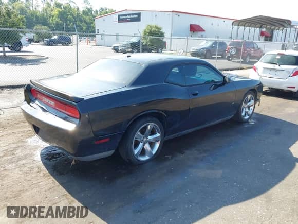 2014 Dodge Challenger R/T с VIN 2C3CDYBT3EH209800, выставлен на аукционе IAAI как лот 42848113 с пробегом 186 882 миль миль и . История ставок и продаж доступна на DreamBid. Изображение 4.