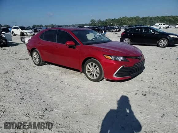 2023 Toyota Camry LE z VIN 4T1C11AK2PU185392, wystawiony jako Copart lot #81824225 z przebiegiem 31 281 mil mil oraz Szkoda całkowita • Salvage title. Historia ofert i sprzedaży dostępna na DreamBid. Obrazek 13.