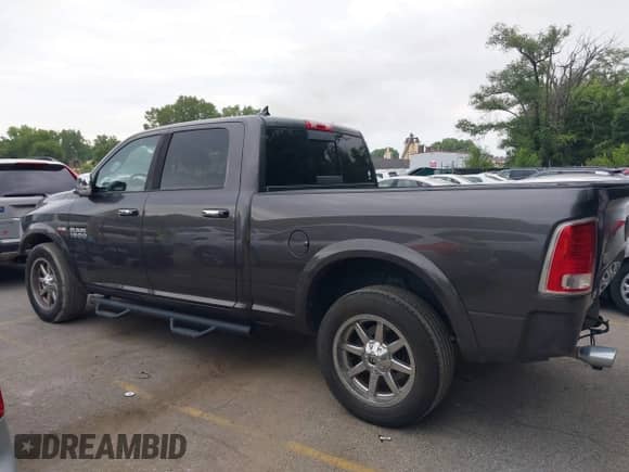 2015 Ram 1500 Laramie с VIN 1C6RR7VT0FS534421, выставлен на аукционе IAAI как лот 39895326 с пробегом 120 437 миль миль и . История ставок и продаж доступна на DreamBid. Изображение 15.