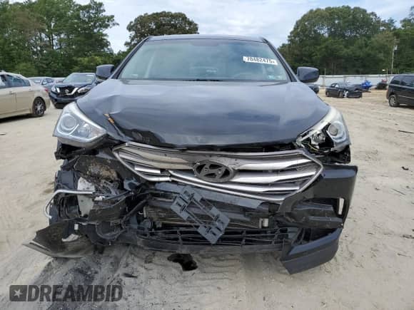 2017 Hyundai Santa Fe 2.4L с VIN 5XYZTDLB6HG381765, выставлен на аукционе Copart как лот 70482475 с пробегом 160 894 миль миль и Списание • Salvage title. История ставок и продаж доступна на DreamBid. Изображение 5.