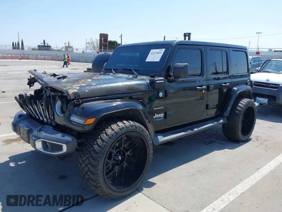 2021 Jeep Wrangler Unlimited Sahara with VIN 1C4JJXP66MW704694, listed as a IAAI auction lot 42615860 with Not provided miles and . Bid and sale history available at DreamBid. Image 2.