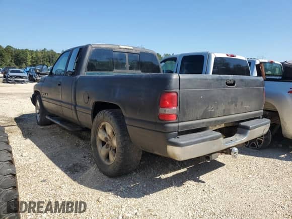 1998 Dodge 1500 z VIN 3B7HC13Y0WG155184, wystawiony jako Copart lot #82089275 z przebiegiem Nie podano mil oraz Szkoda całkowita • Salvage title. Historia ofert i sprzedaży dostępna na DreamBid. Obrazek 2.