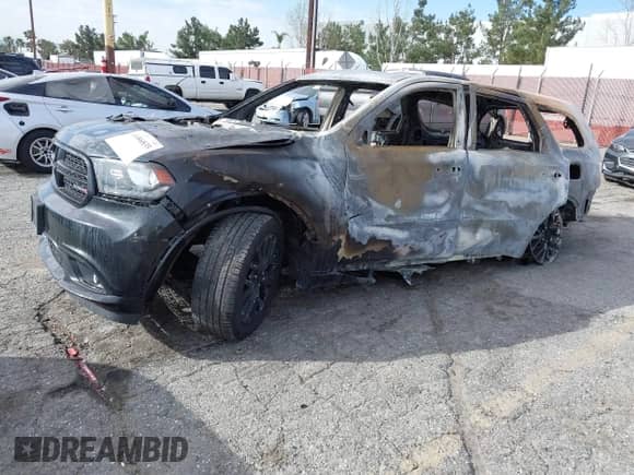 2015 Dodge Durango R/T with VIN 1C4SDHCTXFC869889, listed as a IAAI auction lot 42729182 with Not provided miles and . Bid and sale history available at DreamBid. Image 2.