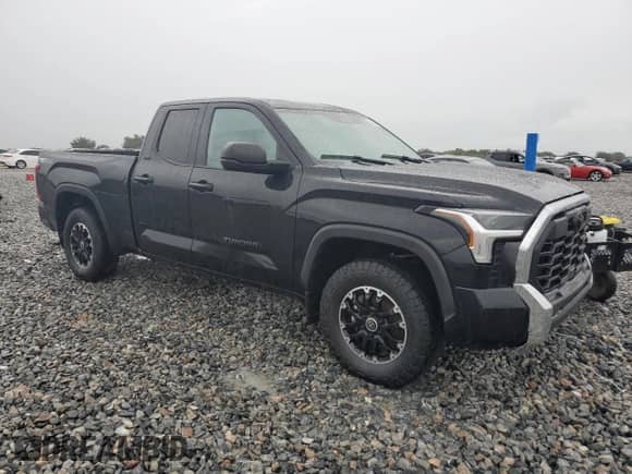 2023 Toyota Tundra SR5 z VIN 5TFLA5DA8PX100567, wystawiony jako Copart lot #80163425 z przebiegiem Nie podano mil oraz Szkoda całkowita • Salvage title. Historia ofert i sprzedaży dostępna na DreamBid. Obrazek 4.