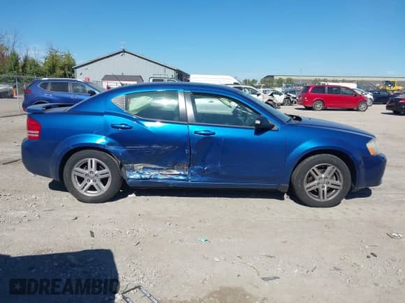 2009 Dodge Avenger SXT with VIN 1B3LC56BX9N548129, listed as a IAAI auction lot 43424658 with 113,697 mi miles and . Bid and sale history available at DreamBid. Image 13.