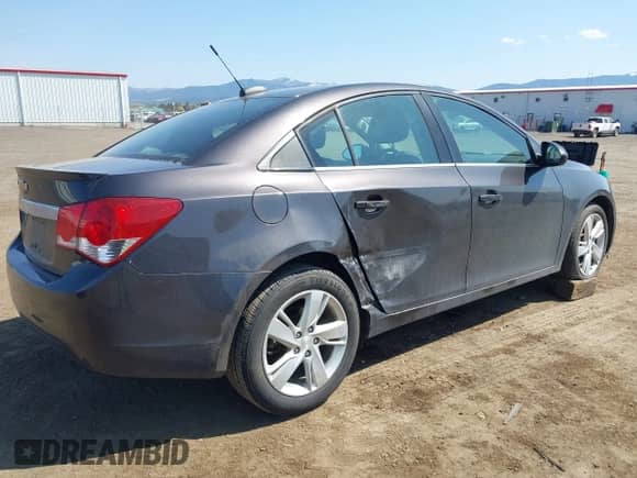 2015 Chevrolet Cruze Diesel z VIN 1G1P75SZ6F7170844, wystawiony jako IAAI lot #42082654 z przebiegiem 99 033 mil mil oraz . Historia ofert i sprzedaży dostępna na DreamBid. Obrazek 4.