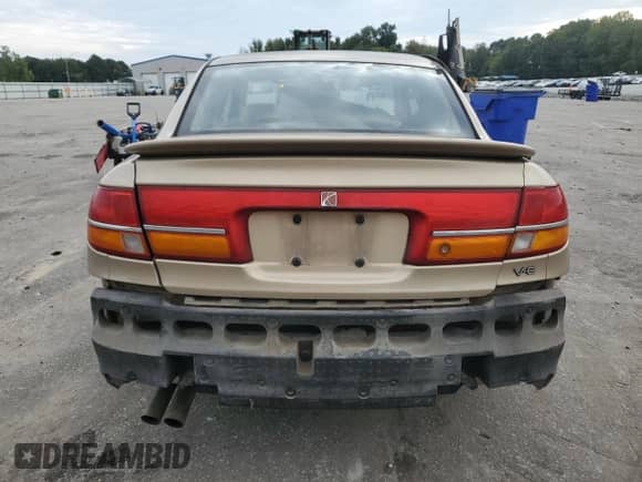 2001 Saturn LS with VIN 1G8JW54R11Y557232, listed as a Copart auction lot 74638904 with 158,729 mi miles and Salvage title. Bid and sale history available at DreamBid. Image 6.