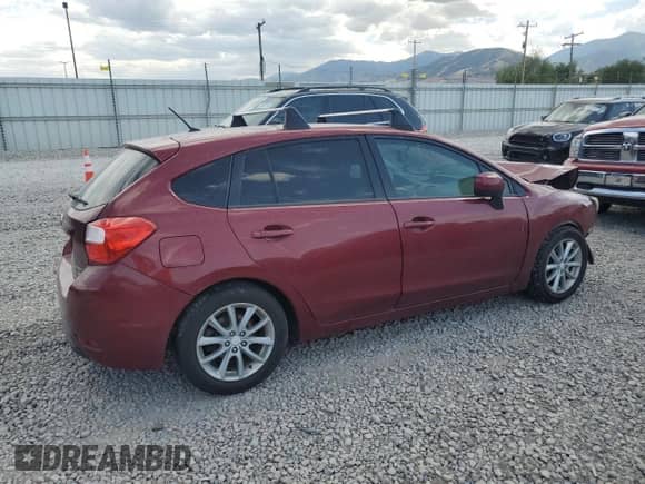 2012 Subaru Impreza Premium with VIN JF1GPAC64CG209047, listed as a Copart auction lot 62761595 with 131,862 mi miles and Salvage title. Bid and sale history available at DreamBid. Image 3.