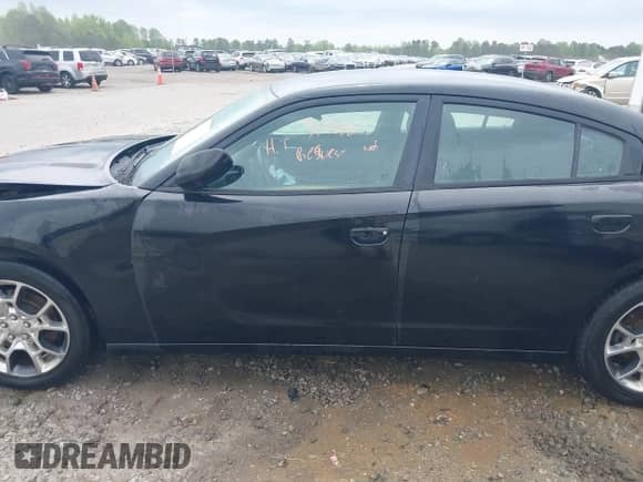 2016 Dodge Charger SE z VIN 2C3CDXFG4GH294267, wystawiony jako IAAI lot #41887393 z przebiegiem 117 649 mil mil oraz . Historia ofert i sprzedaży dostępna na DreamBid. Obrazek 14.