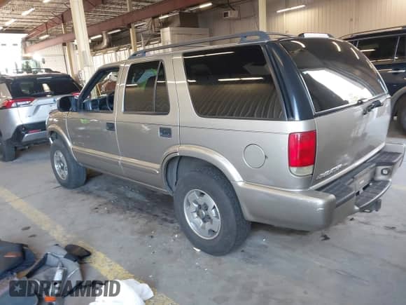 2004 Chevrolet Blazer LS с VIN 1GNDT13X44K102362, выставлен на аукционе IAAI как лот 41944259 с пробегом 119 296 миль миль и . История ставок и продаж доступна на DreamBid. Изображение 3.