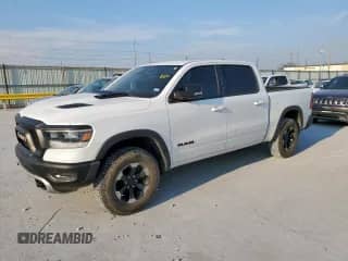 2019 Ram 1500 Rebel с VIN 1C6SRFLT9KN559485, выставлен на аукционе Copart как лот 80832085 с пробегом Не указан миль и Списание • Salvage title. История ставок и продаж доступна на DreamBid. Изображение 1.