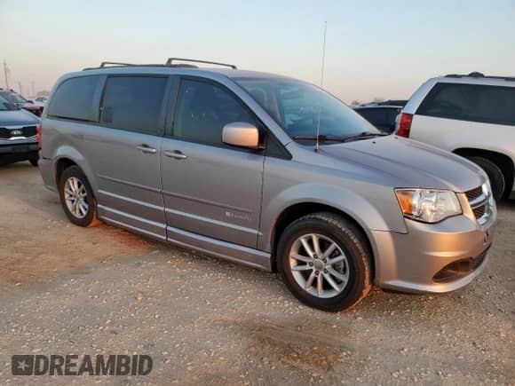 2014 Dodge Grand Caravan SXT with VIN 2C4RDGCG5ER477307, listed as a Copart auction lot 84047895 with 152,010 mi miles and Salvage title. Bid and sale history available at DreamBid. Image 4.