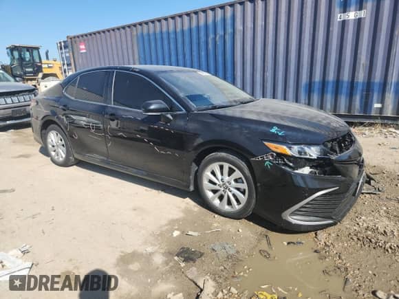 2023 Toyota Camry LE z VIN 4T1R11AK7PU774707, wystawiony jako Copart lot #84275165 z przebiegiem 42 170 mil mil oraz Szkoda całkowita • Salvage title. Historia ofert i sprzedaży dostępna na DreamBid. Obrazek 4.