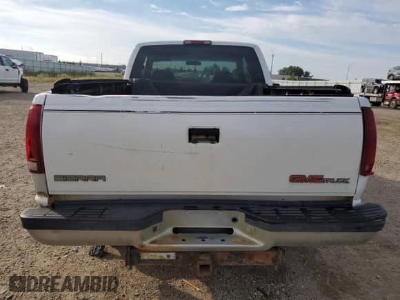 1995 GMC Sierra 1500 z VIN 2GTEC19K8S1573758, wystawiony jako Copart lot #64785104 z przebiegiem 191 121 mil mil oraz Szkoda całkowita • Salvage title. Historia ofert i sprzedaży dostępna na DreamBid. Obrazek 6.
