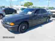 1997 BMW 7 Series 740i with VIN WBAGF8325VDL45398, listed as a IAAI auction lot 41910072 with 174,590 mi miles and . Bid and sale history available at DreamBid. Image 2.