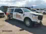 2022 Ford F-150 XL with VIN 1FTFX1E86NKD22373, listed as a Copart auction lot 69963114 with 96,983 mi miles and Salvage title. Bid and sale history available at DreamBid. Image 4.