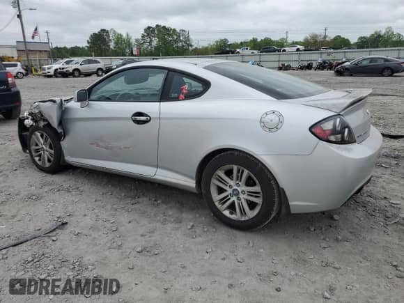 2008 Hyundai Tiburon GS с VIN KMHHM66DX8U288114, выставлен на аукционе Copart как лот 51866995 с пробегом Не указан миль и Списание • Salvage title. История ставок и продаж доступна на DreamBid. Изображение 2.