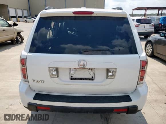 2006 Honda Pilot EX-L z VIN 5FNYF28656B039280, wystawiony jako Copart lot #70669555 z przebiegiem 232 655 mil mil oraz Szkoda całkowita • Salvage title. Historia ofert i sprzedaży dostępna na DreamBid. Obrazek 6.
