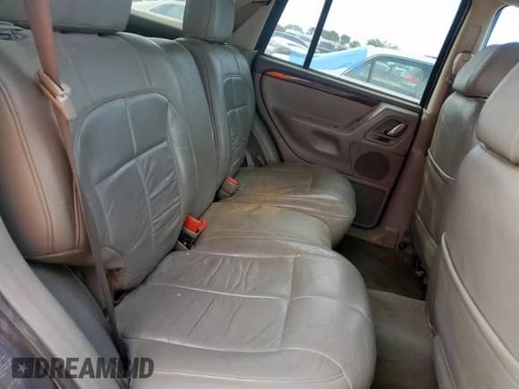 2004 Jeep Grand Cherokee with VIN 1J8GX58J54C121513, listed as a Copart auction lot 59384005 with 221,397 mi miles and Salvage title. Bid and sale history available at DreamBid. Image 11.