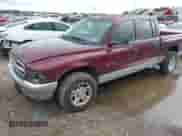 2001 Dodge Dakota Sport with VIN 1B7HL2AN11S318912, listed as a IAAI auction lot 42101199 with 128,006 mi miles and . Bid and sale history available at DreamBid. Image 2.