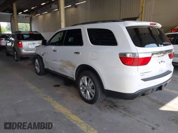 2013 Dodge Durango Crew with VIN 1C4SDJDT9DC697017, listed as a IAAI auction lot 42918013 with 153,270 mi miles and . Bid and sale history available at DreamBid. Image 3.