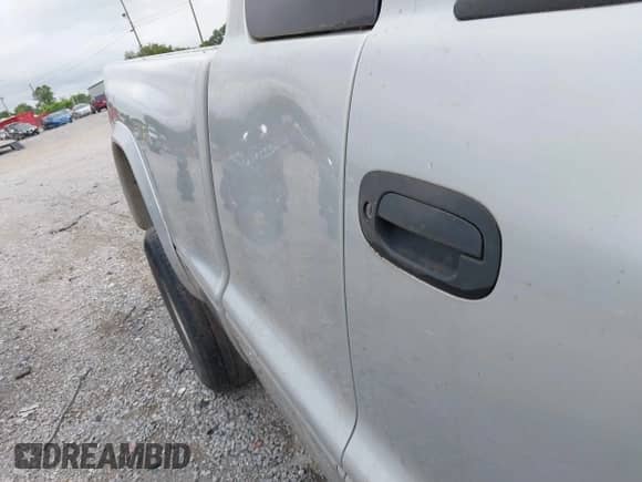 2004 Dodge Dakota with VIN 1D7HG12K44S628159, listed as a IAAI auction lot 42952012 with Not provided miles and . Bid and sale history available at DreamBid. Image 13.