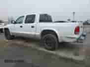 2002 Dodge Dakota SLT with VIN 1B7HL48N22S636413, listed as a Copart auction lot 47884475 with 226,723 mi miles and Clean title. Bid and sale history available at DreamBid. Image 2.
