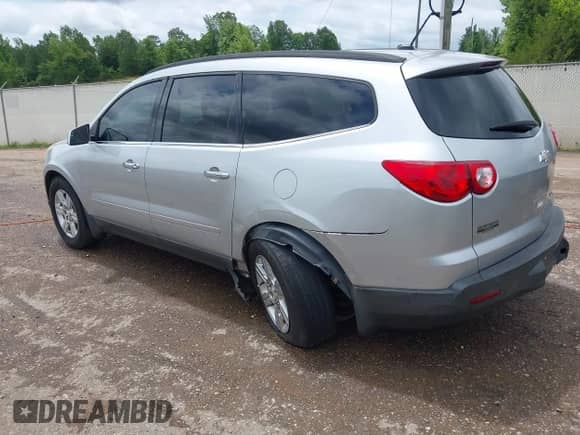 2012 Chevrolet Traverse 1LT z VIN 1GNKRGED2CJ173995, wystawiony jako IAAI lot #42385475 z przebiegiem 222 978 mil mil oraz . Historia ofert i sprzedaży dostępna na DreamBid. Obrazek 3.